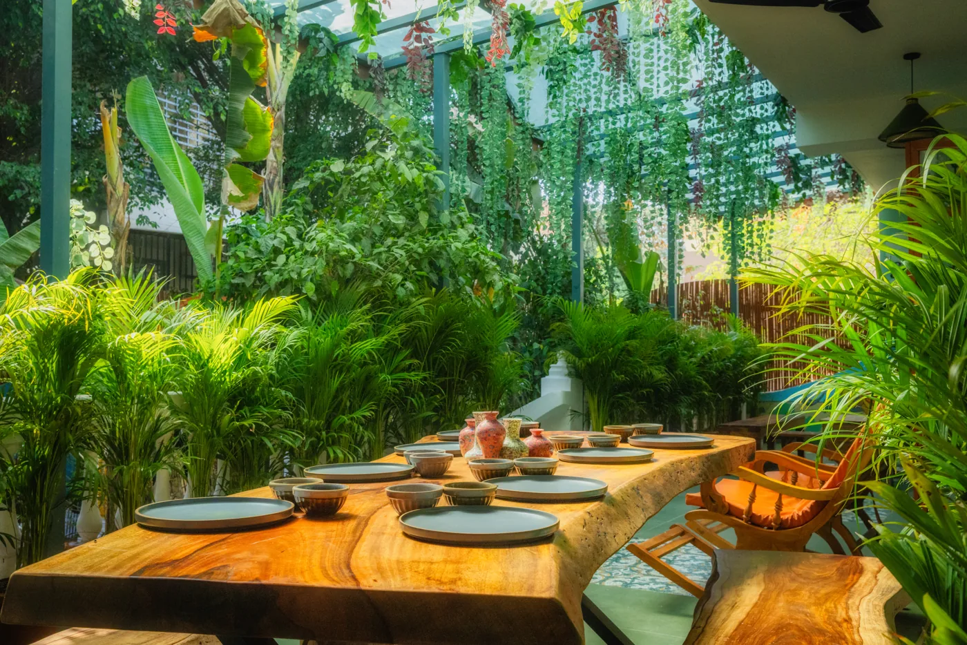 Alfresco dining area beside the blue villa