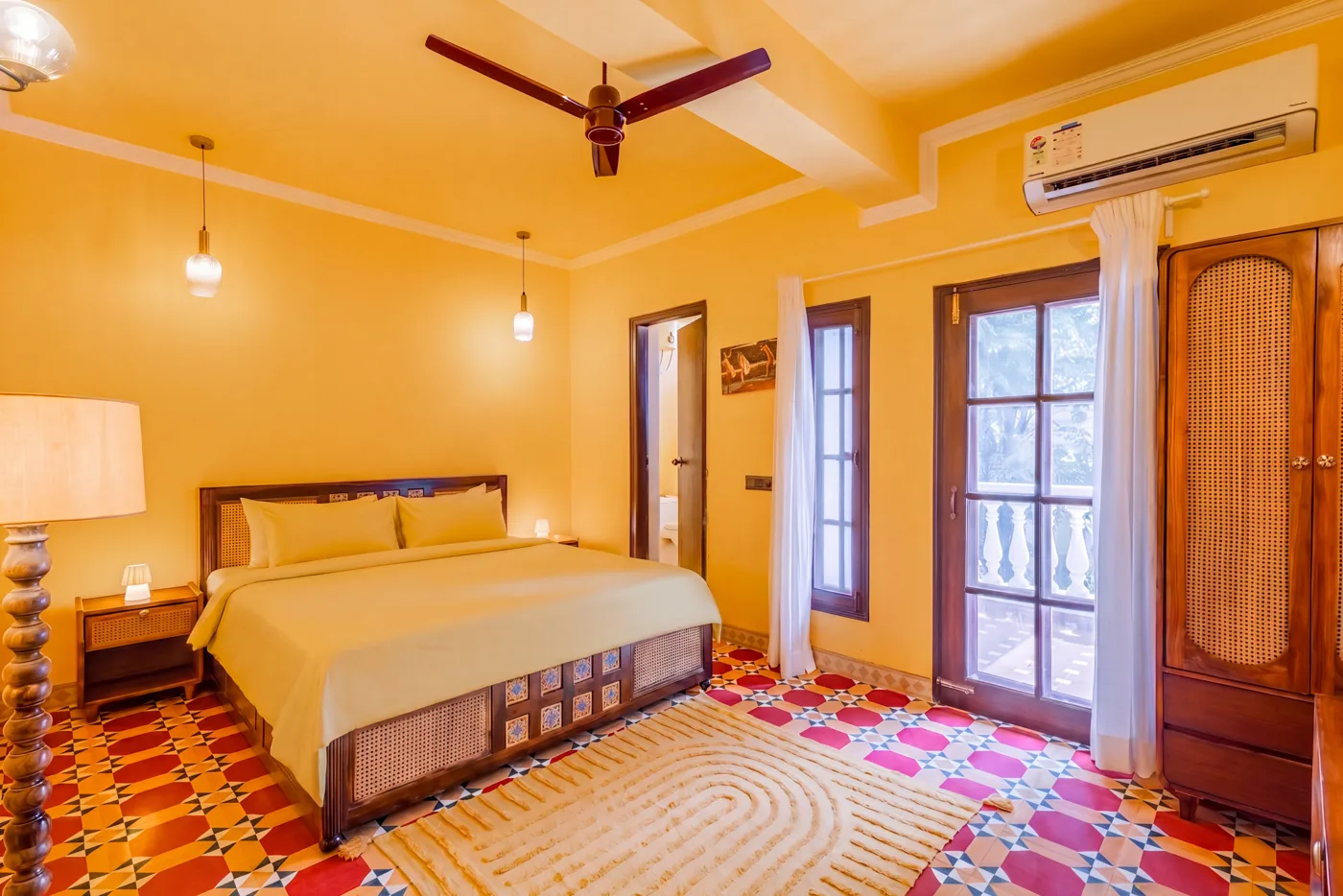 Sunny yellow bedroom with patterned floor
